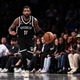 NEW YORK, NEW YORK - NOVEMBER 01: Kyrie Irving #11 of the Brooklyn Nets brings the ball up the court during the third quarter of the game against the Chicago Bulls at Barclays Center on November 01, 2022, in New York City.